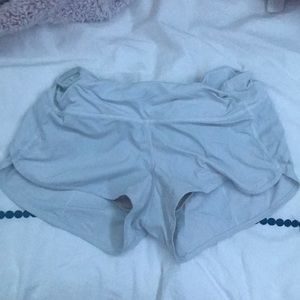 White lululemon speed up shorts.